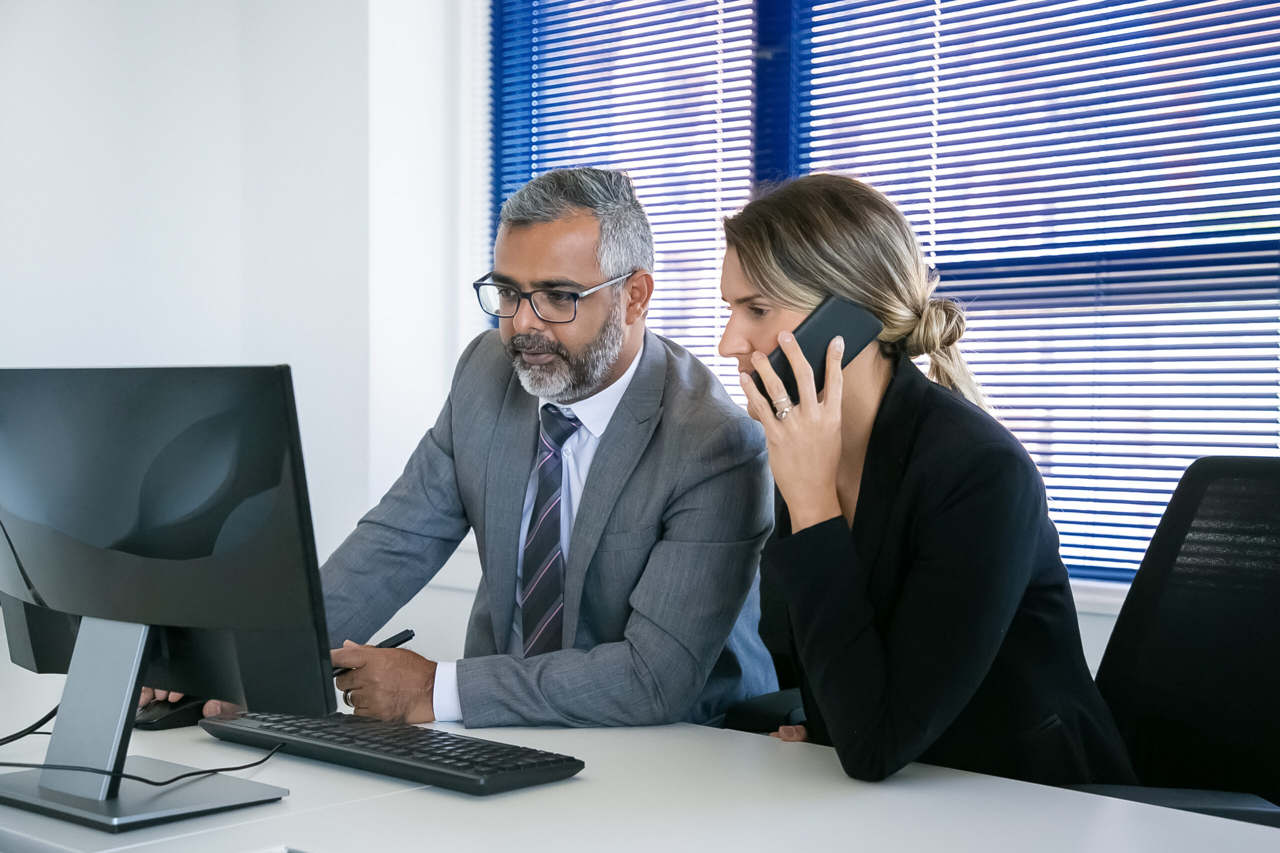 focused business colleagues working together